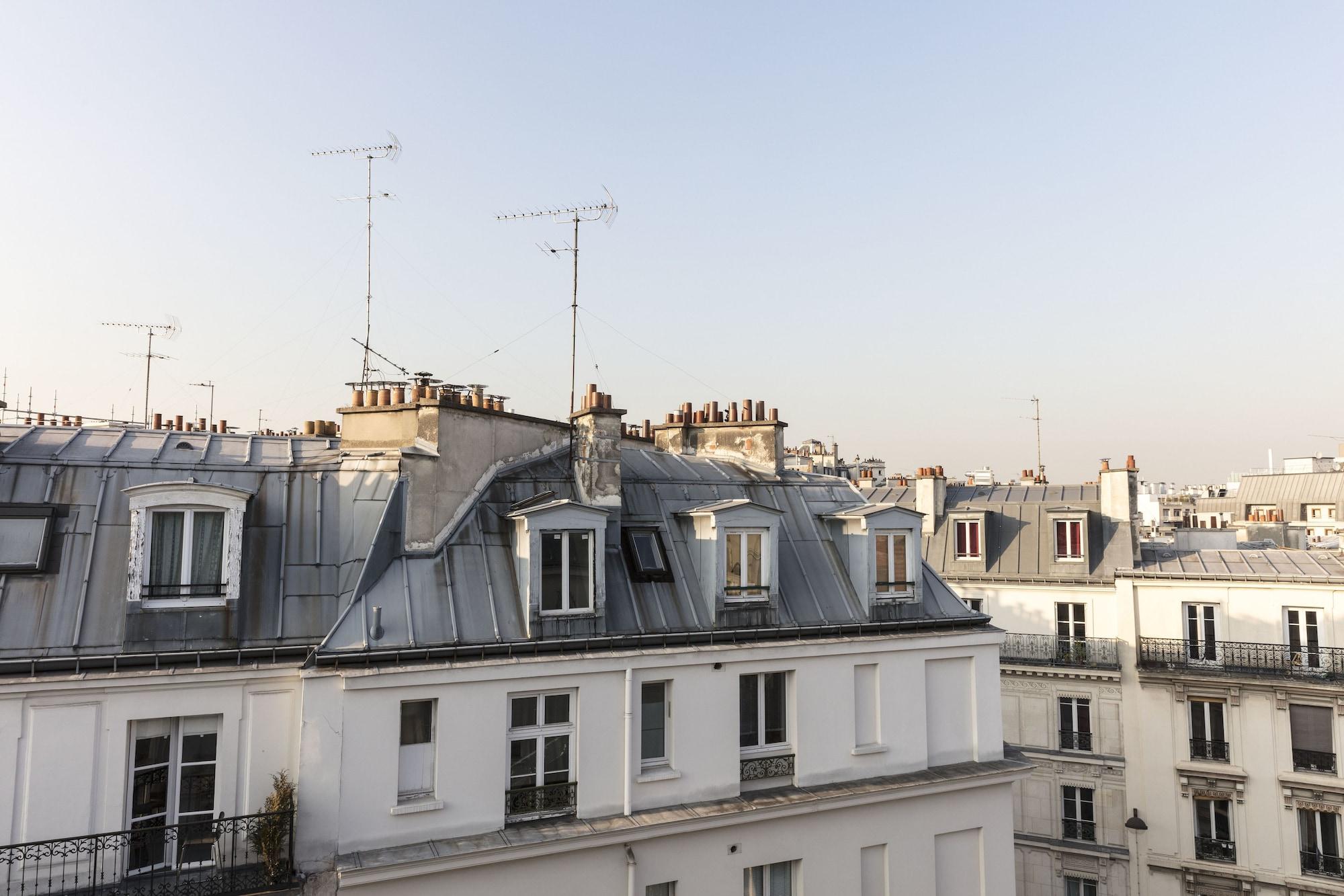 Maison Bréguet París Exterior foto The roofs of Paris