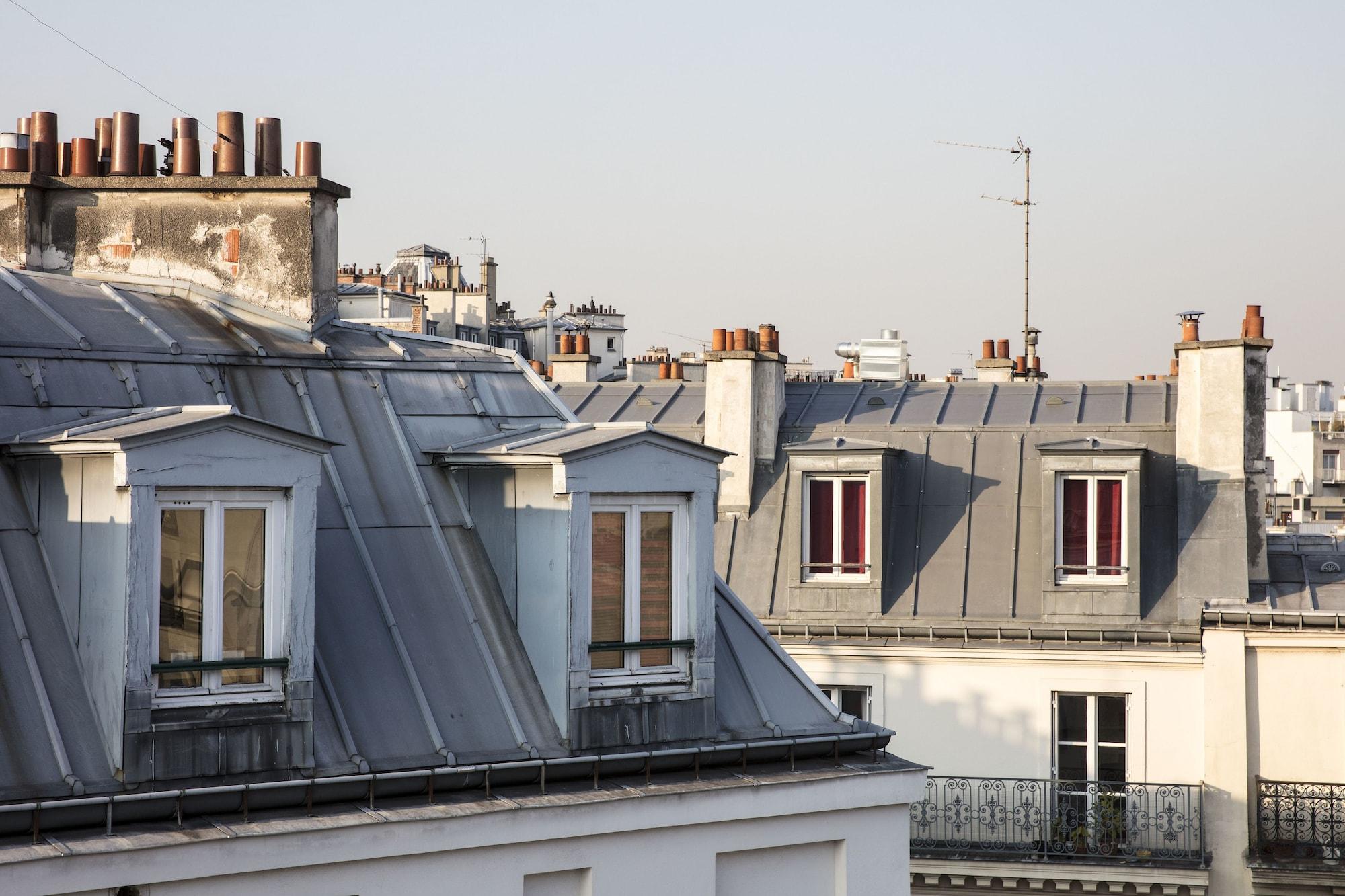 Maison Bréguet París Exterior foto The roofs of Paris